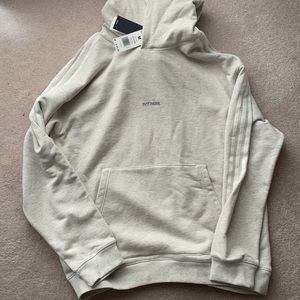 New ivy park unisex hoodie. White color. Medium.